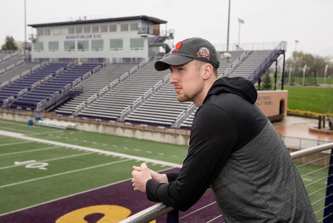 Sports Management student looking over the Ashland University football field